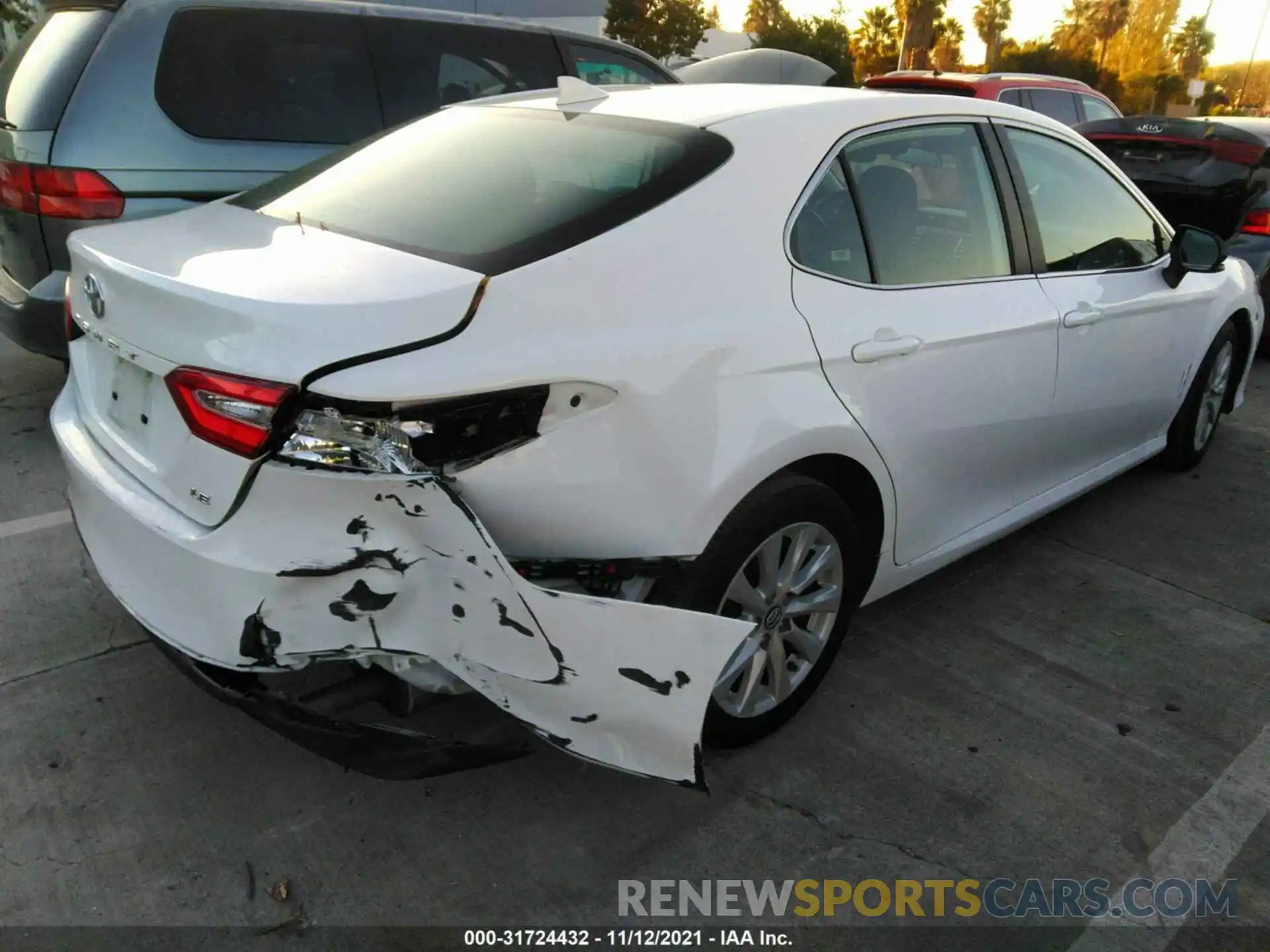 4 Photograph of a damaged car 4T1B11HK7KU205856 TOYOTA CAMRY 2019