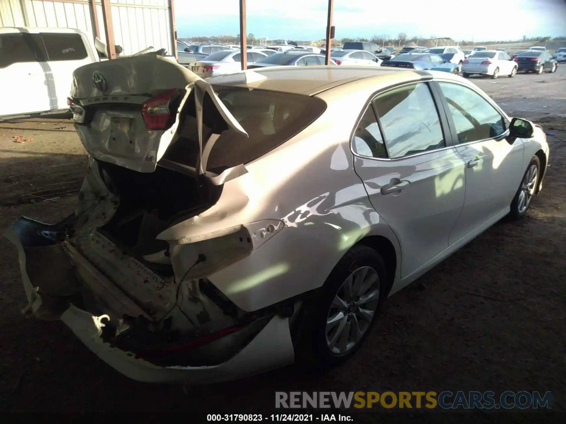 4 Photograph of a damaged car 4T1B11HK7KU206702 TOYOTA CAMRY 2019