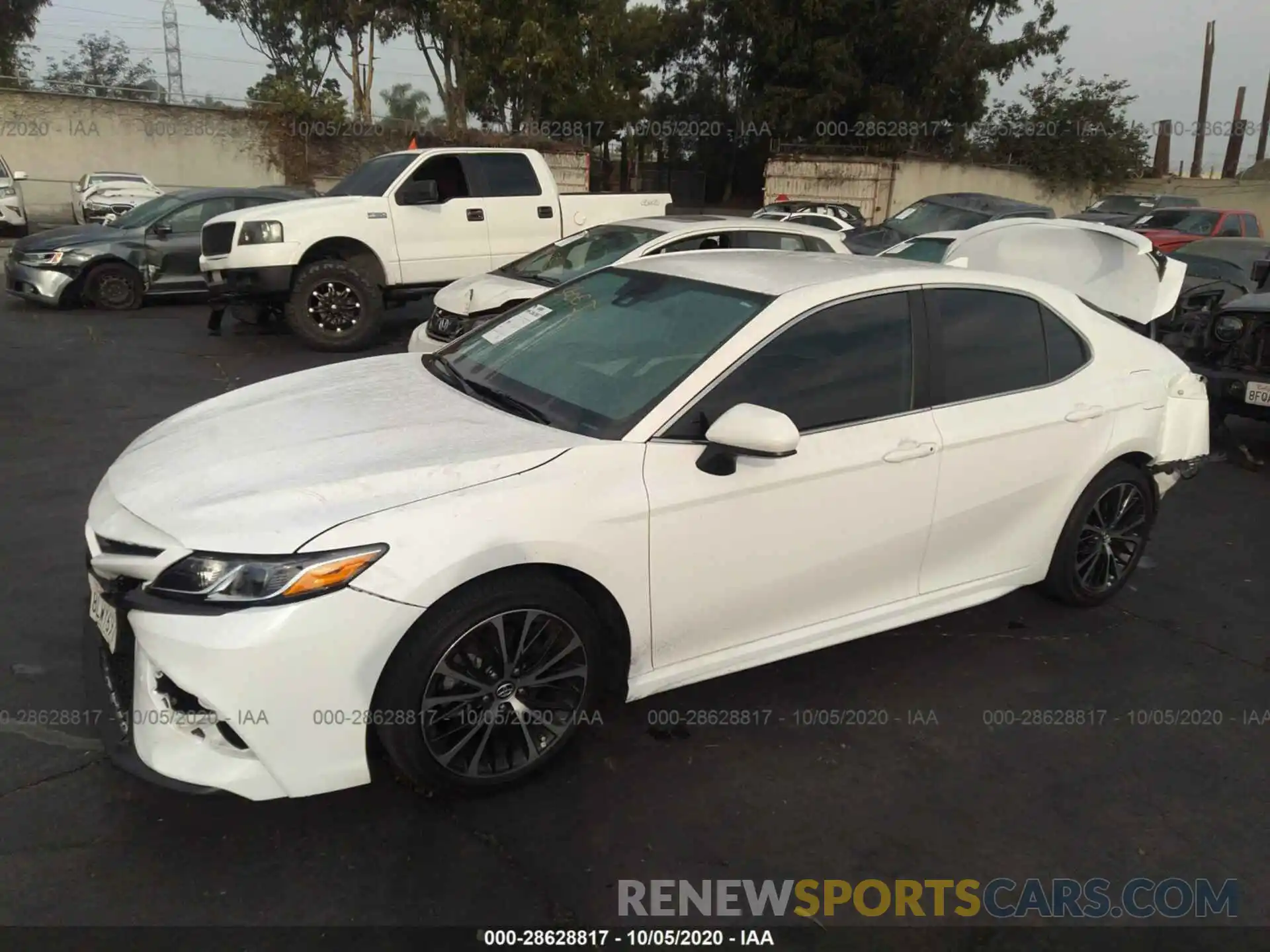 2 Photograph of a damaged car 4T1B11HK7KU208935 TOYOTA CAMRY 2019