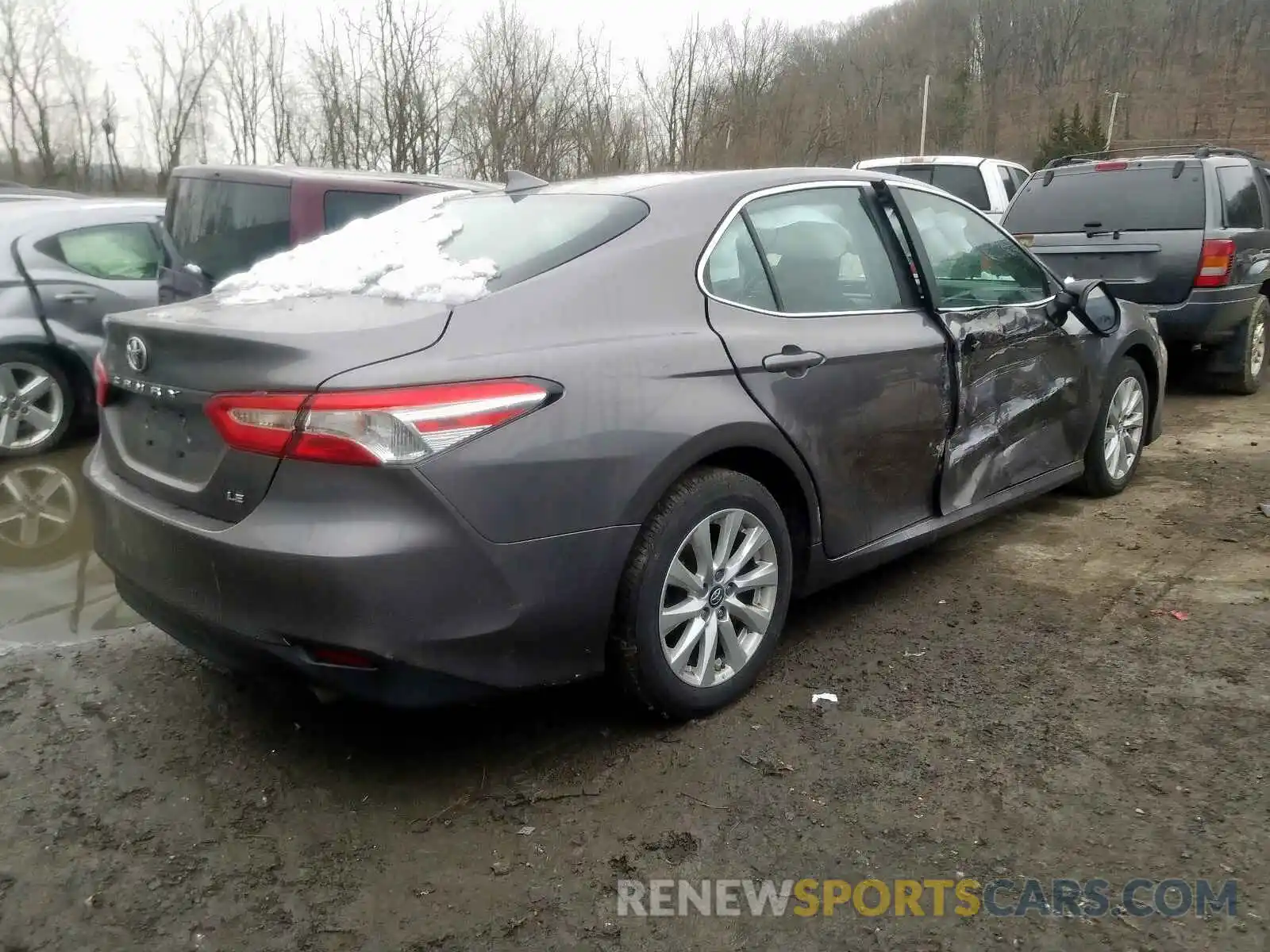 4 Photograph of a damaged car 4T1B11HK7KU209163 TOYOTA CAMRY 2019