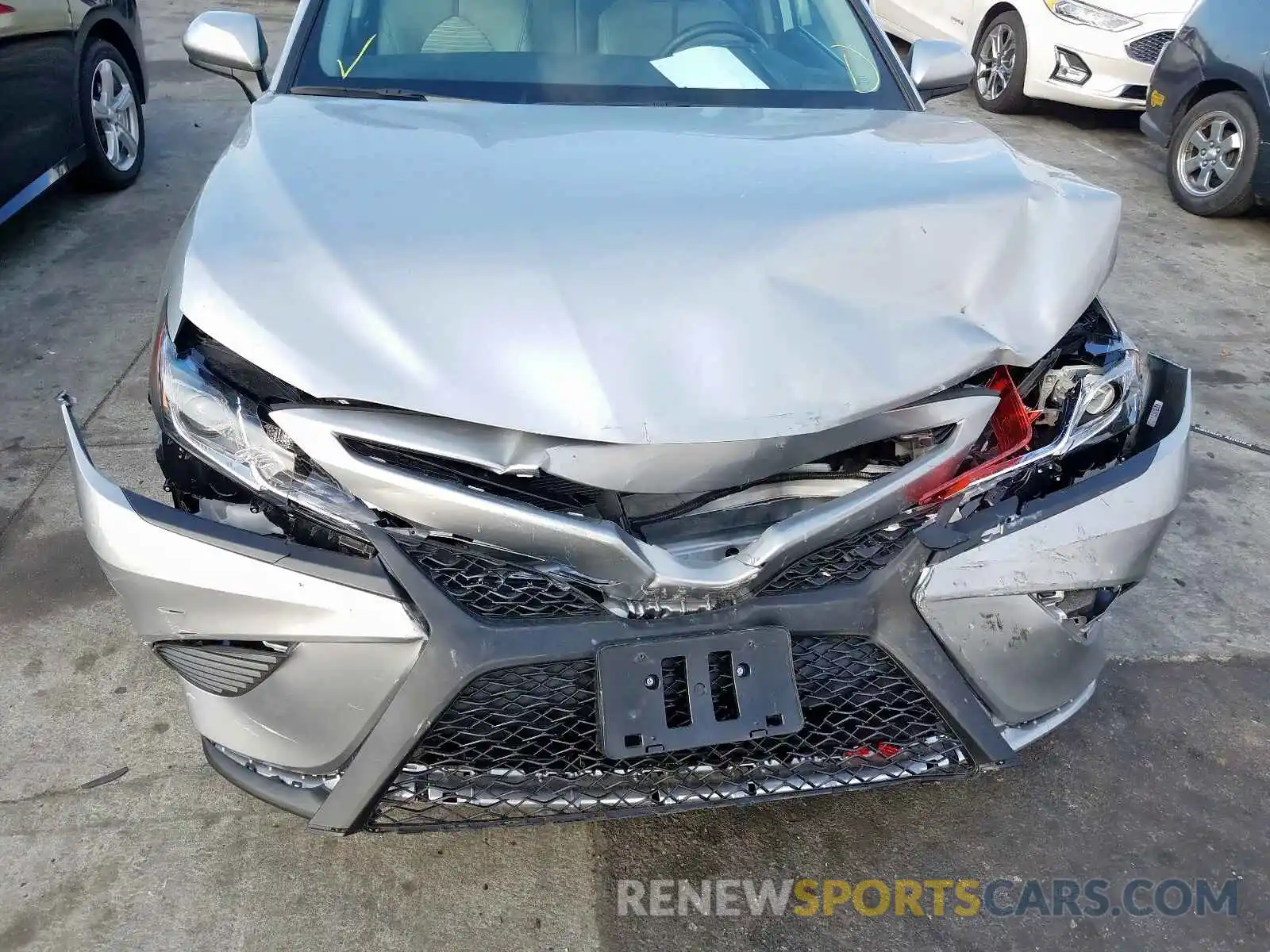 9 Photograph of a damaged car 4T1B11HK7KU211933 TOYOTA CAMRY 2019