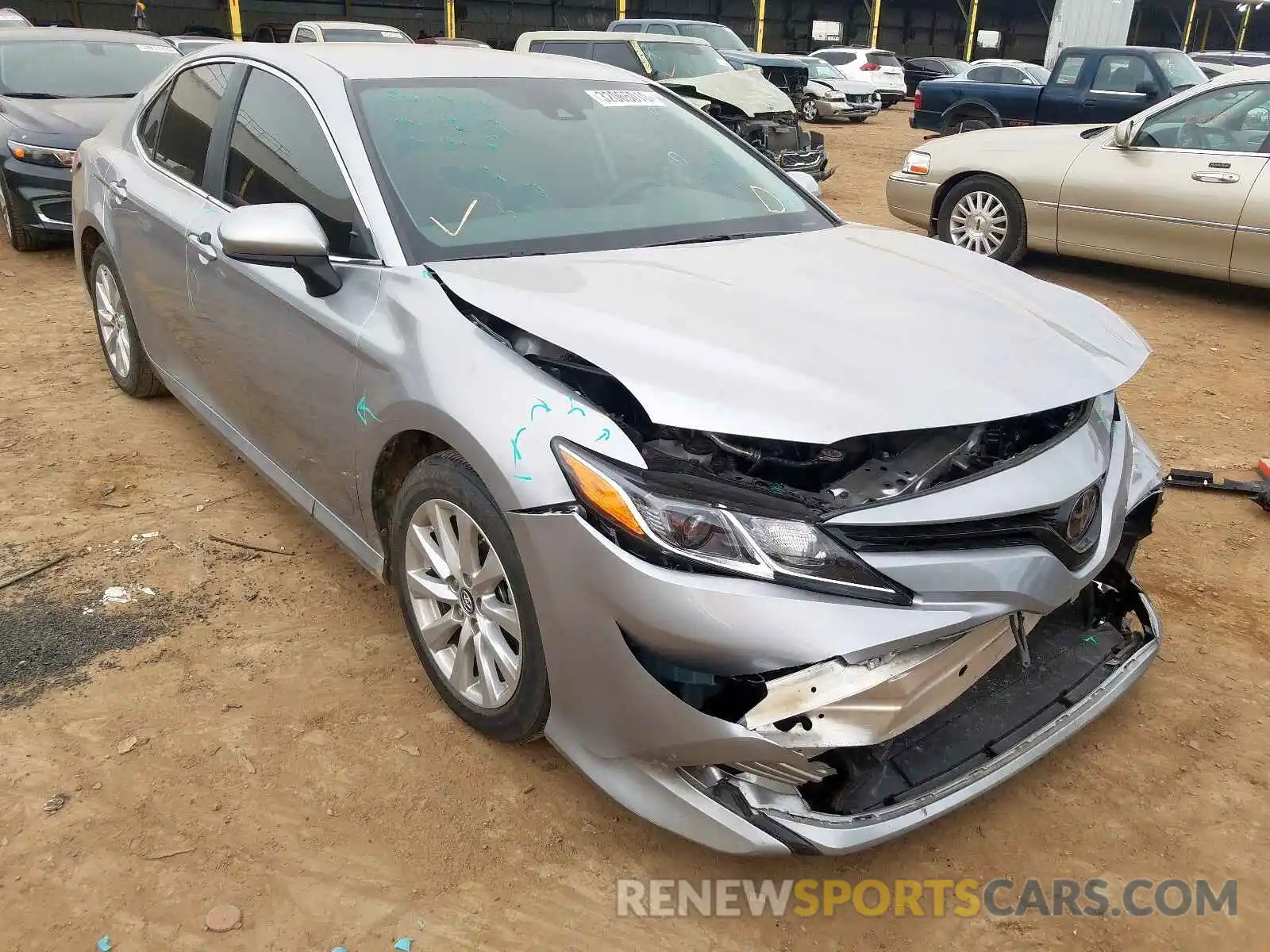 1 Photograph of a damaged car 4T1B11HK7KU212211 TOYOTA CAMRY 2019