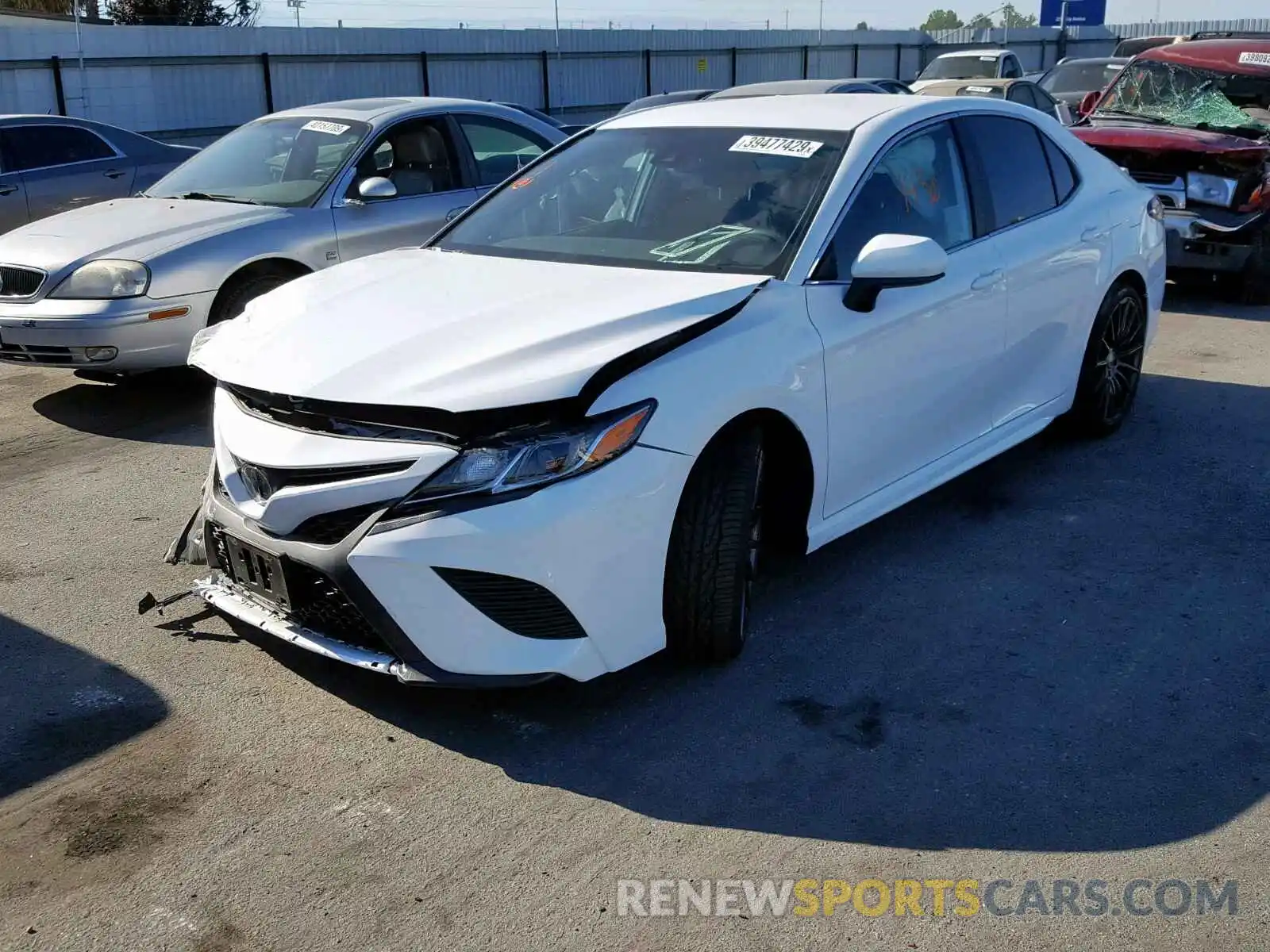 2 Photograph of a damaged car 4T1B11HK7KU212581 TOYOTA CAMRY 2019