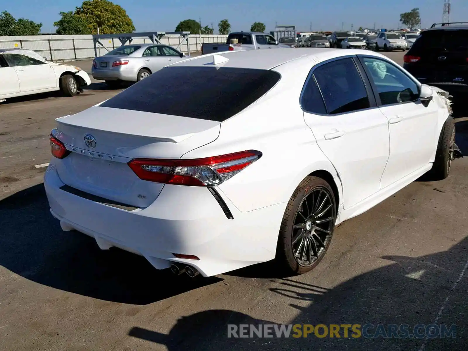 4 Photograph of a damaged car 4T1B11HK7KU212581 TOYOTA CAMRY 2019