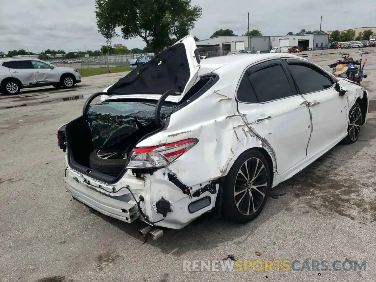 4 Photograph of a damaged car 4T1B11HK7KU213049 TOYOTA CAMRY 2019