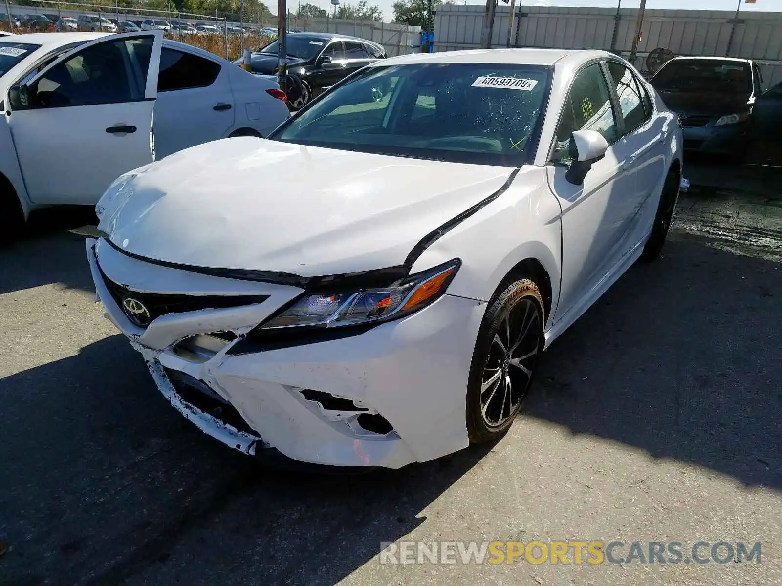 2 Photograph of a damaged car 4T1B11HK7KU213651 TOYOTA CAMRY 2019