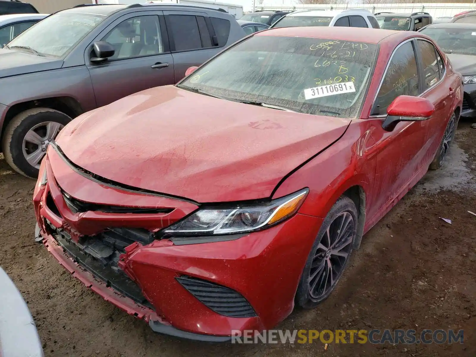 2 Photograph of a damaged car 4T1B11HK7KU216033 TOYOTA CAMRY 2019