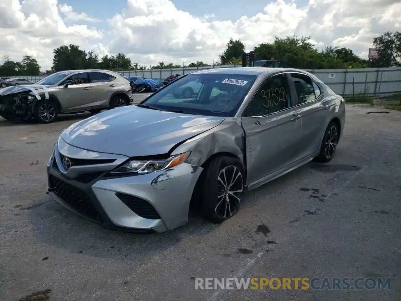 2 Photograph of a damaged car 4T1B11HK7KU218803 TOYOTA CAMRY 2019