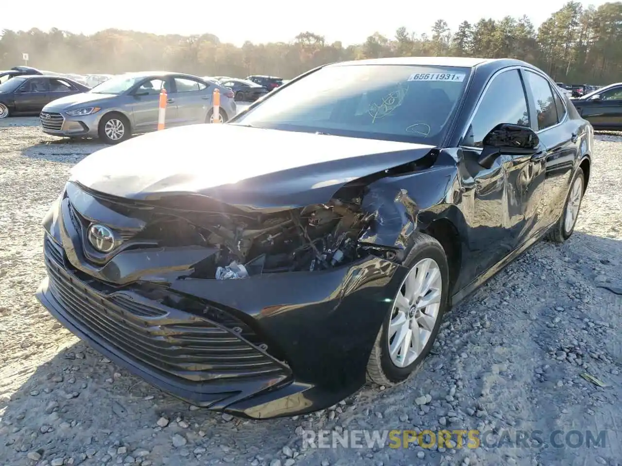 2 Photograph of a damaged car 4T1B11HK7KU220857 TOYOTA CAMRY 2019