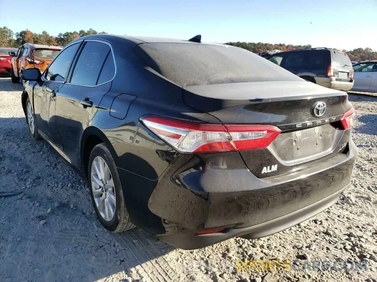 3 Photograph of a damaged car 4T1B11HK7KU220857 TOYOTA CAMRY 2019