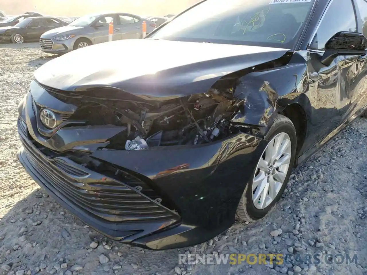 9 Photograph of a damaged car 4T1B11HK7KU220857 TOYOTA CAMRY 2019