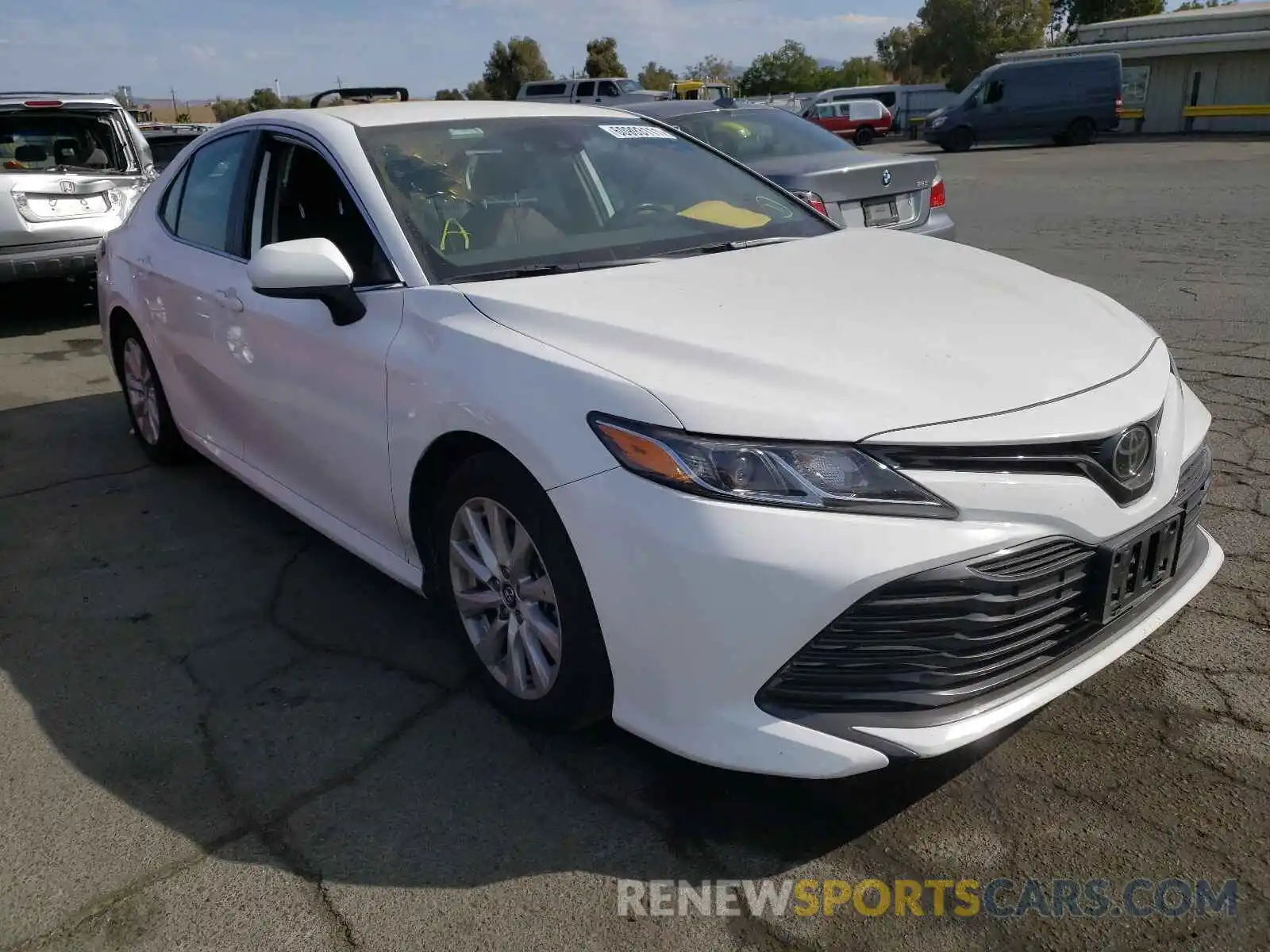 1 Photograph of a damaged car 4T1B11HK7KU221555 TOYOTA CAMRY 2019