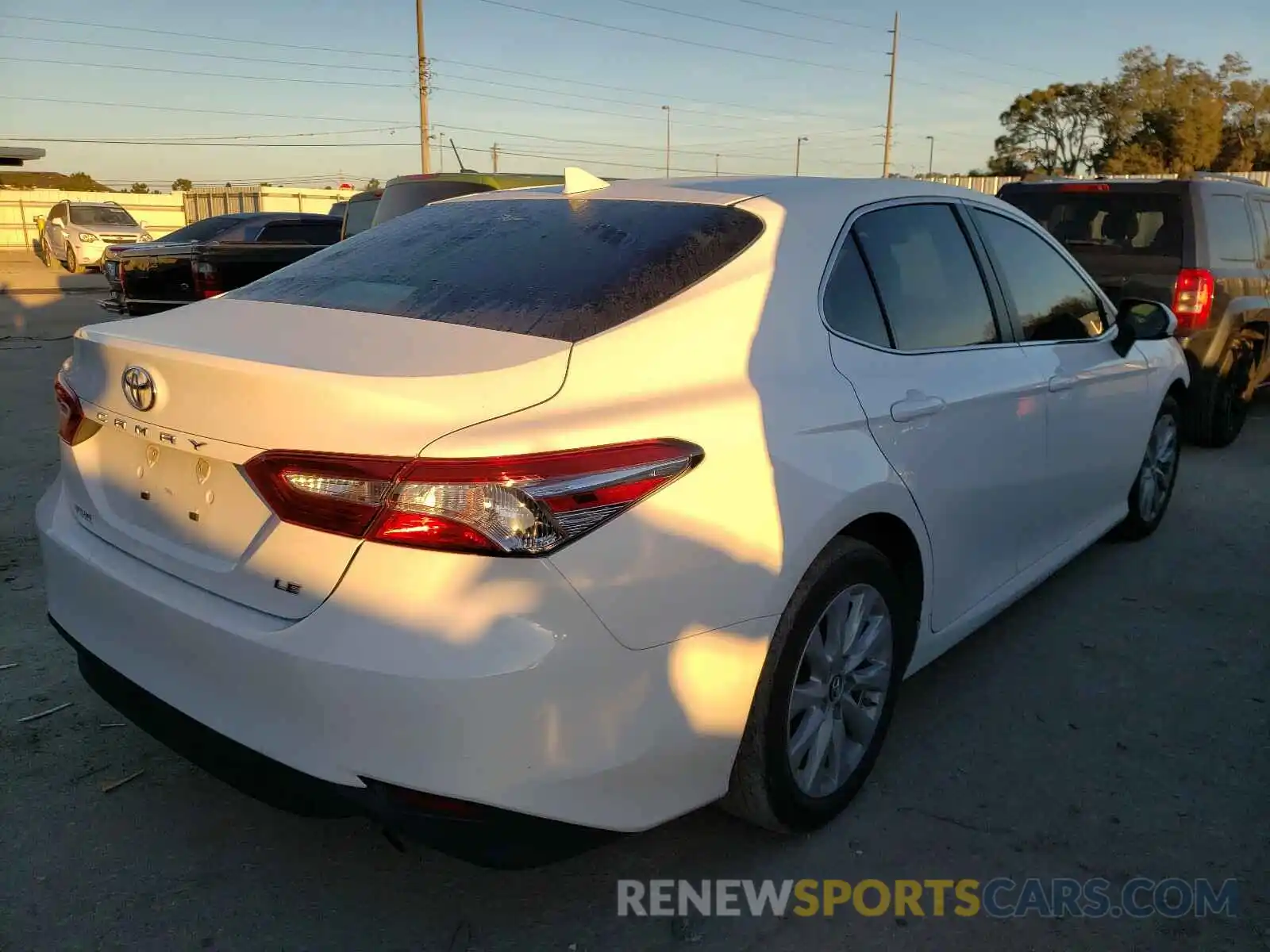 4 Photograph of a damaged car 4T1B11HK7KU227338 TOYOTA CAMRY 2019