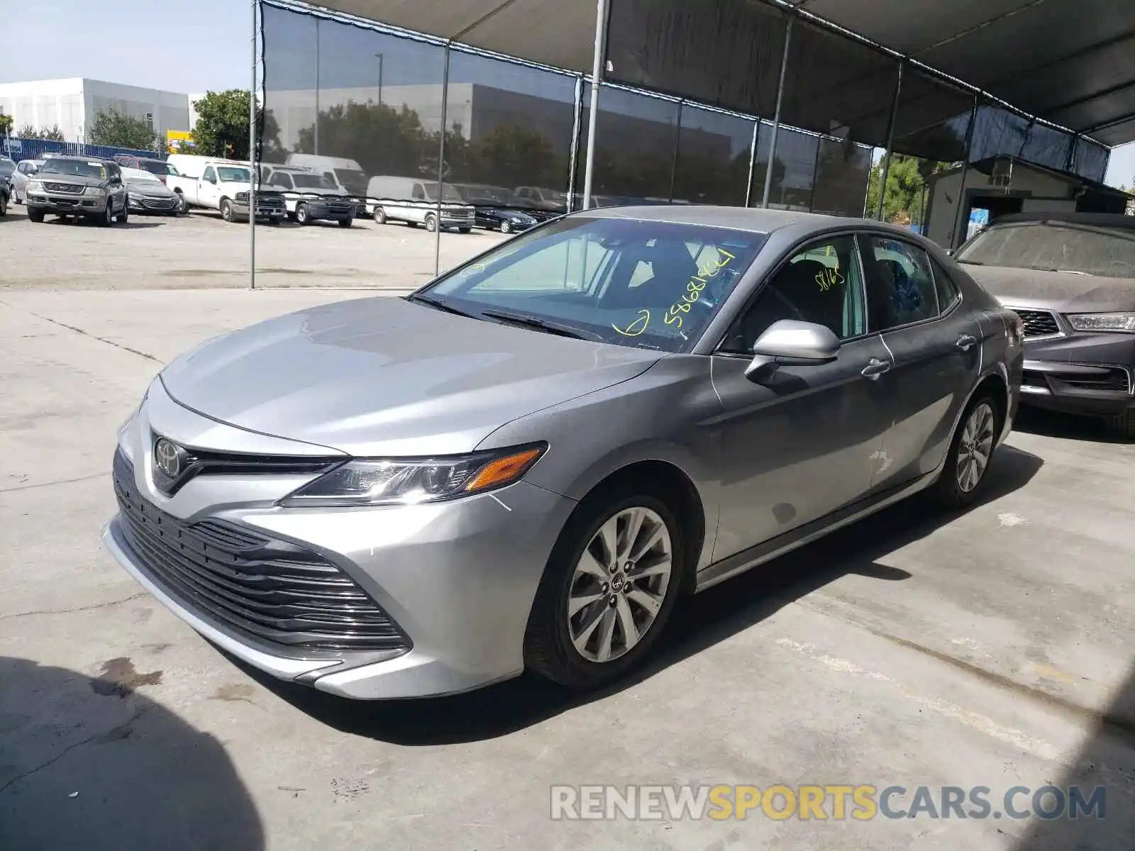 2 Photograph of a damaged car 4T1B11HK7KU229784 TOYOTA CAMRY 2019