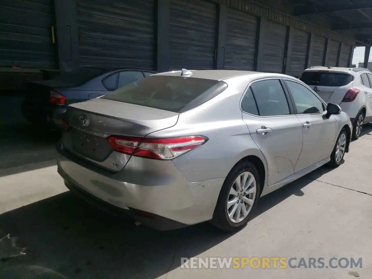 4 Photograph of a damaged car 4T1B11HK7KU229784 TOYOTA CAMRY 2019