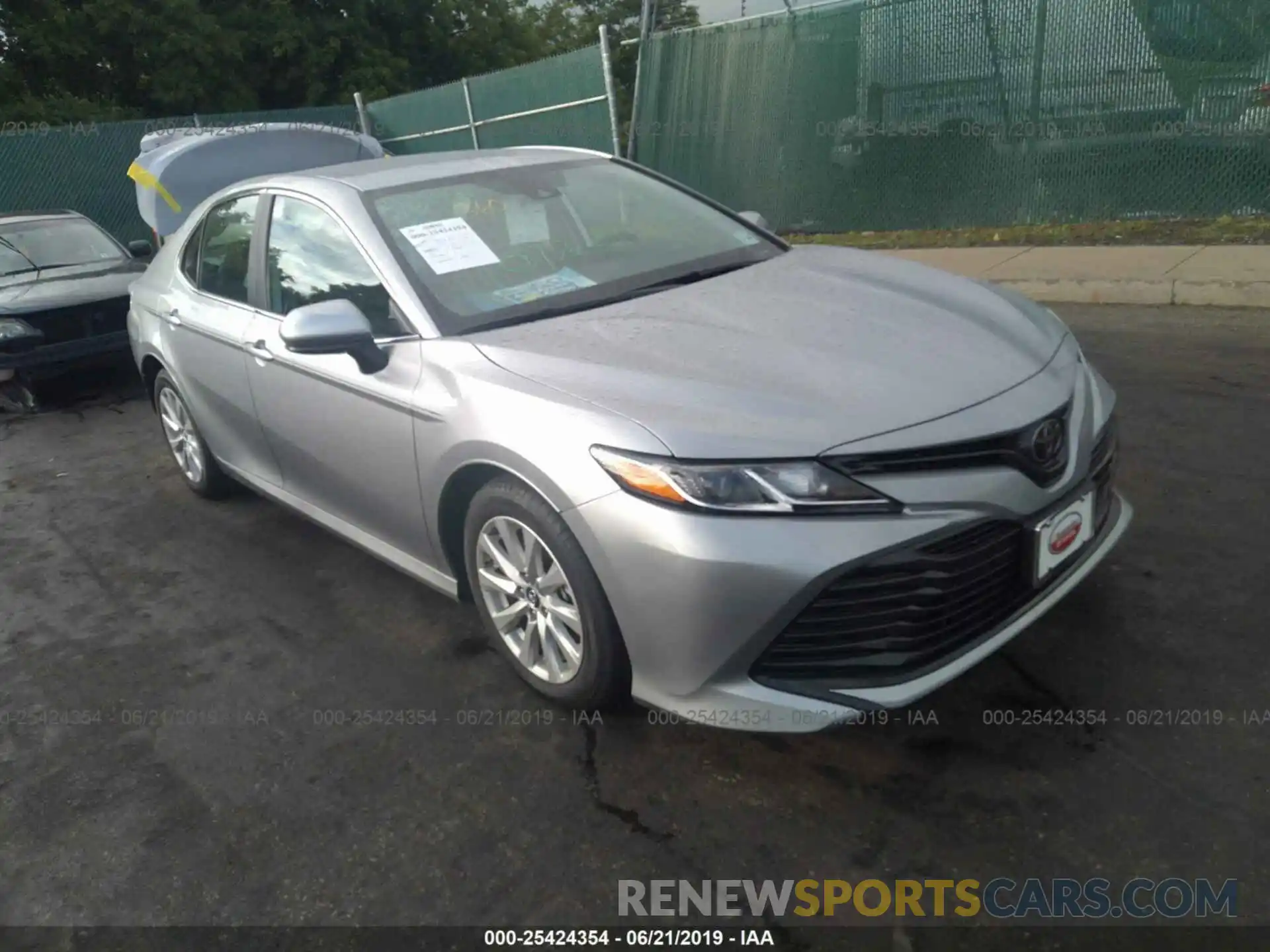 1 Photograph of a damaged car 4T1B11HK7KU230658 TOYOTA CAMRY 2019