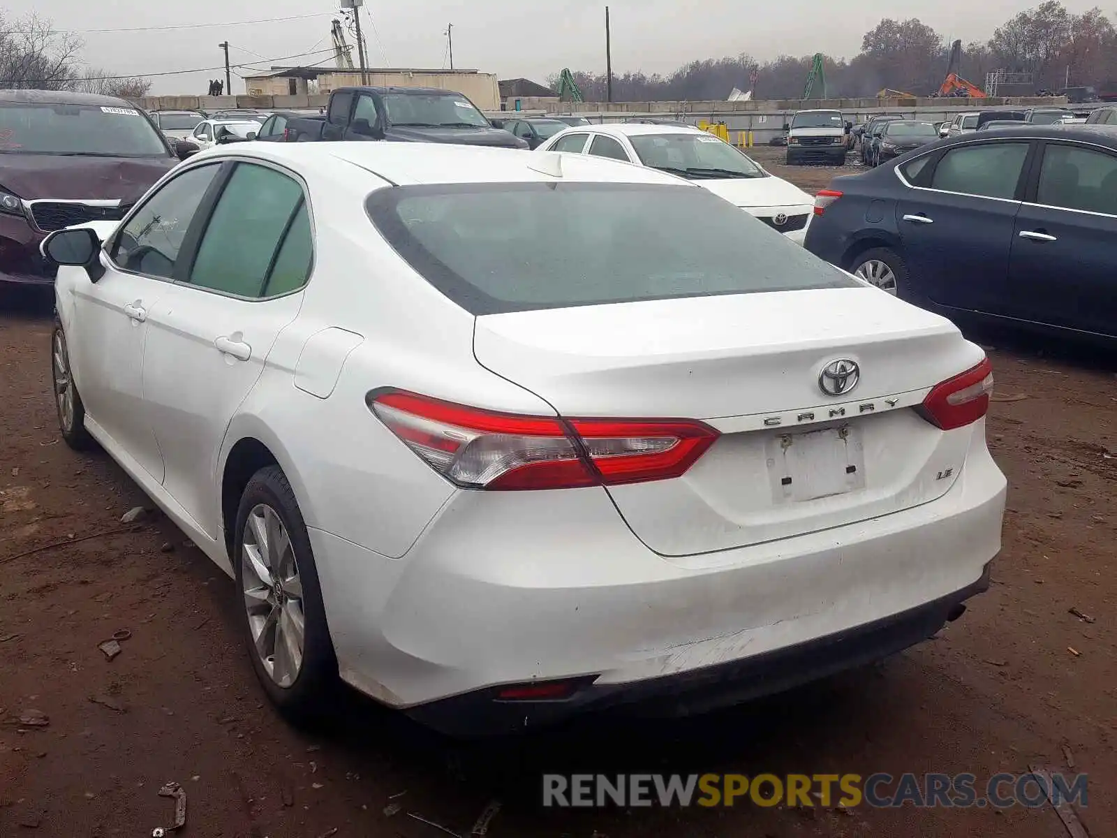 4 Photograph of a damaged car 4T1B11HK7KU230787 TOYOTA CAMRY 2019