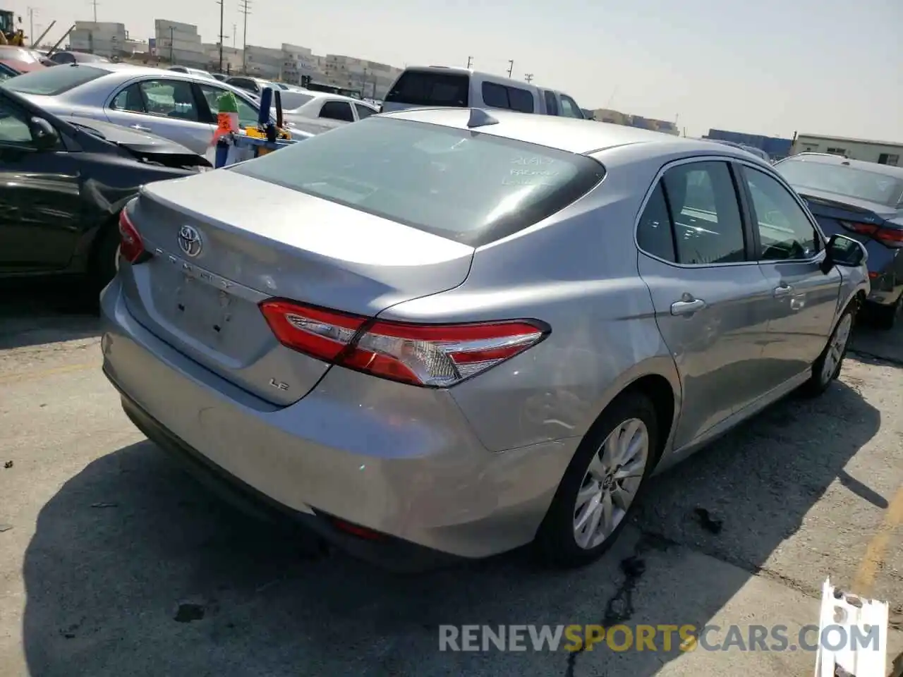 4 Photograph of a damaged car 4T1B11HK7KU232264 TOYOTA CAMRY 2019