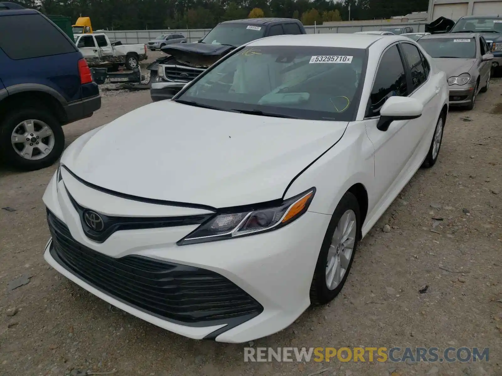 2 Photograph of a damaged car 4T1B11HK7KU233317 TOYOTA CAMRY 2019