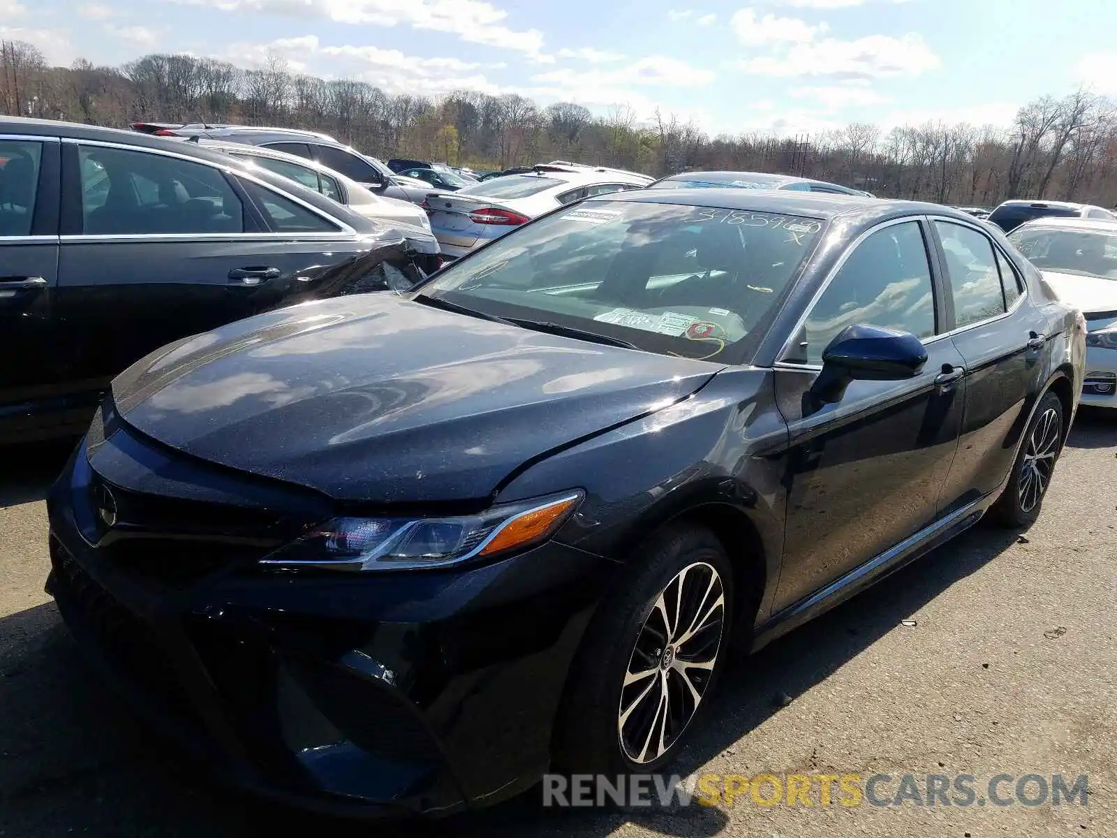 2 Photograph of a damaged car 4T1B11HK7KU233916 TOYOTA CAMRY 2019