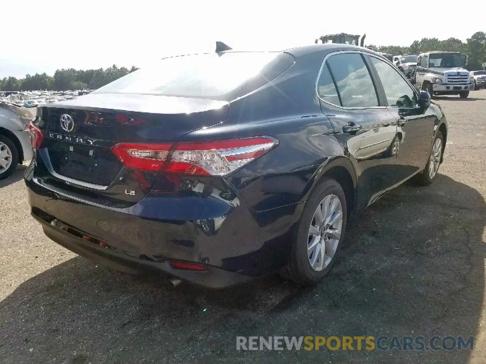 4 Photograph of a damaged car 4T1B11HK7KU233978 TOYOTA CAMRY 2019