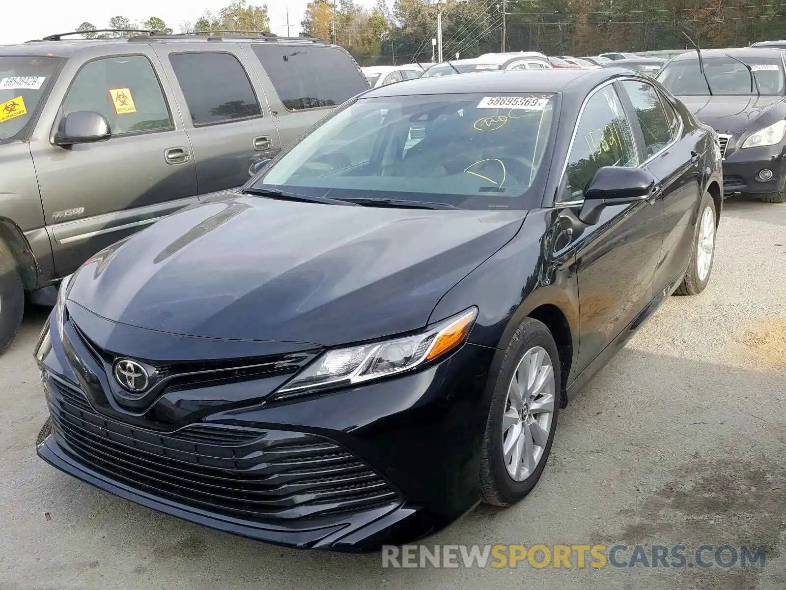 2 Photograph of a damaged car 4T1B11HK7KU237061 TOYOTA CAMRY 2019