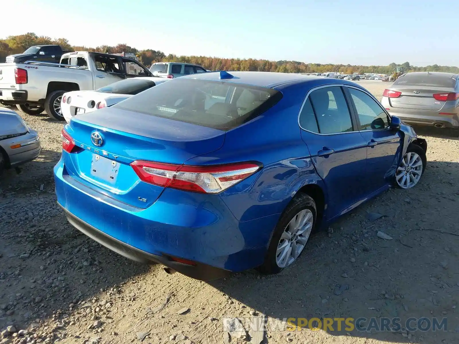 4 Фотография поврежденного автомобиля 4T1B11HK7KU237464 TOYOTA CAMRY 2019