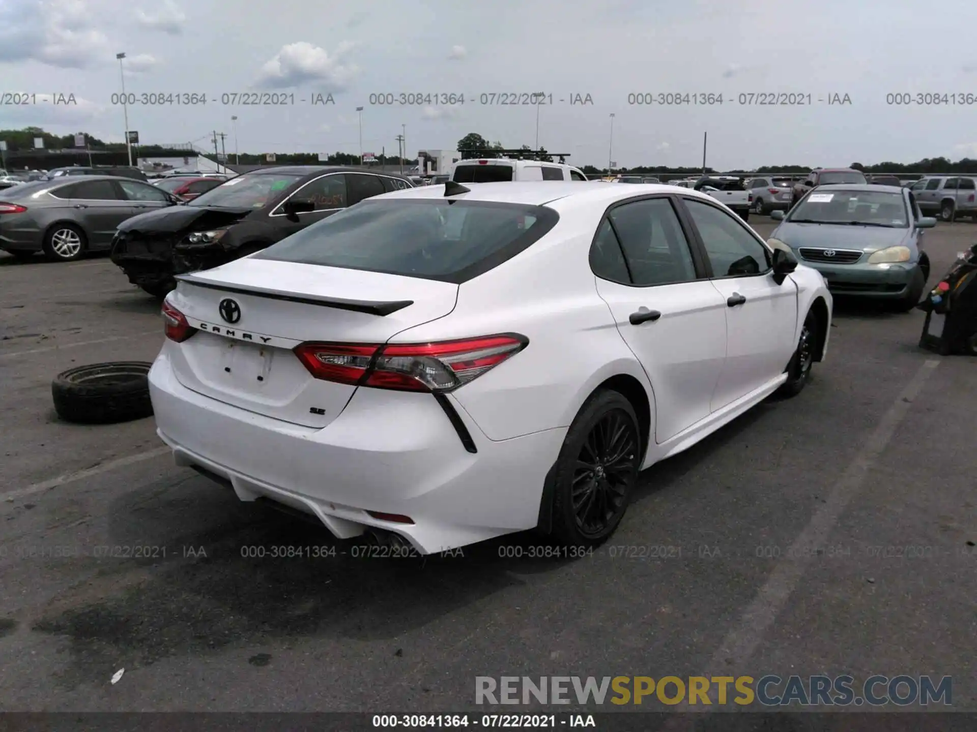 4 Photograph of a damaged car 4T1B11HK7KU237593 TOYOTA CAMRY 2019