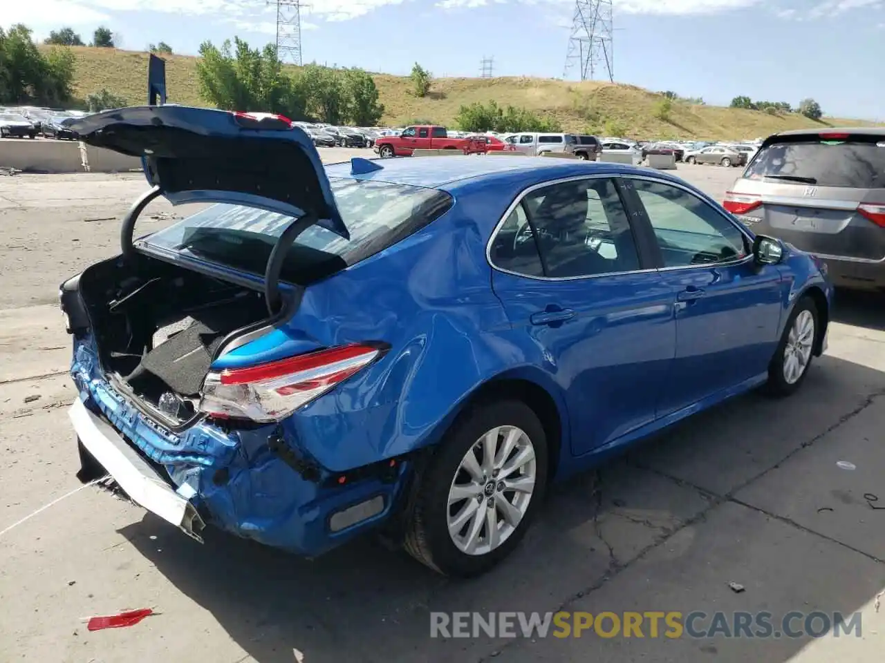 4 Photograph of a damaged car 4T1B11HK7KU238145 TOYOTA CAMRY 2019