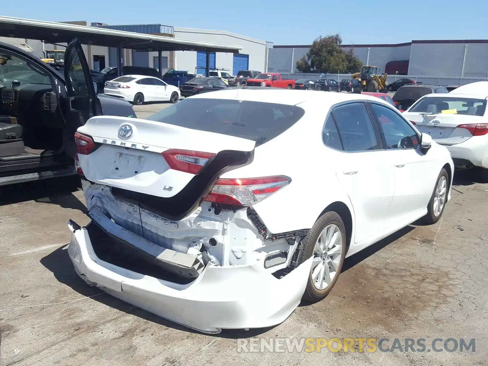 4 Photograph of a damaged car 4T1B11HK7KU238730 TOYOTA CAMRY 2019