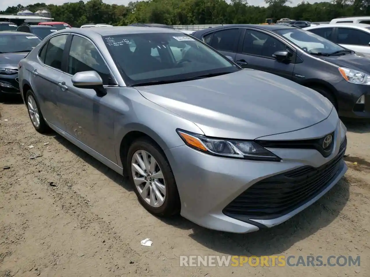 1 Photograph of a damaged car 4T1B11HK7KU238873 TOYOTA CAMRY 2019