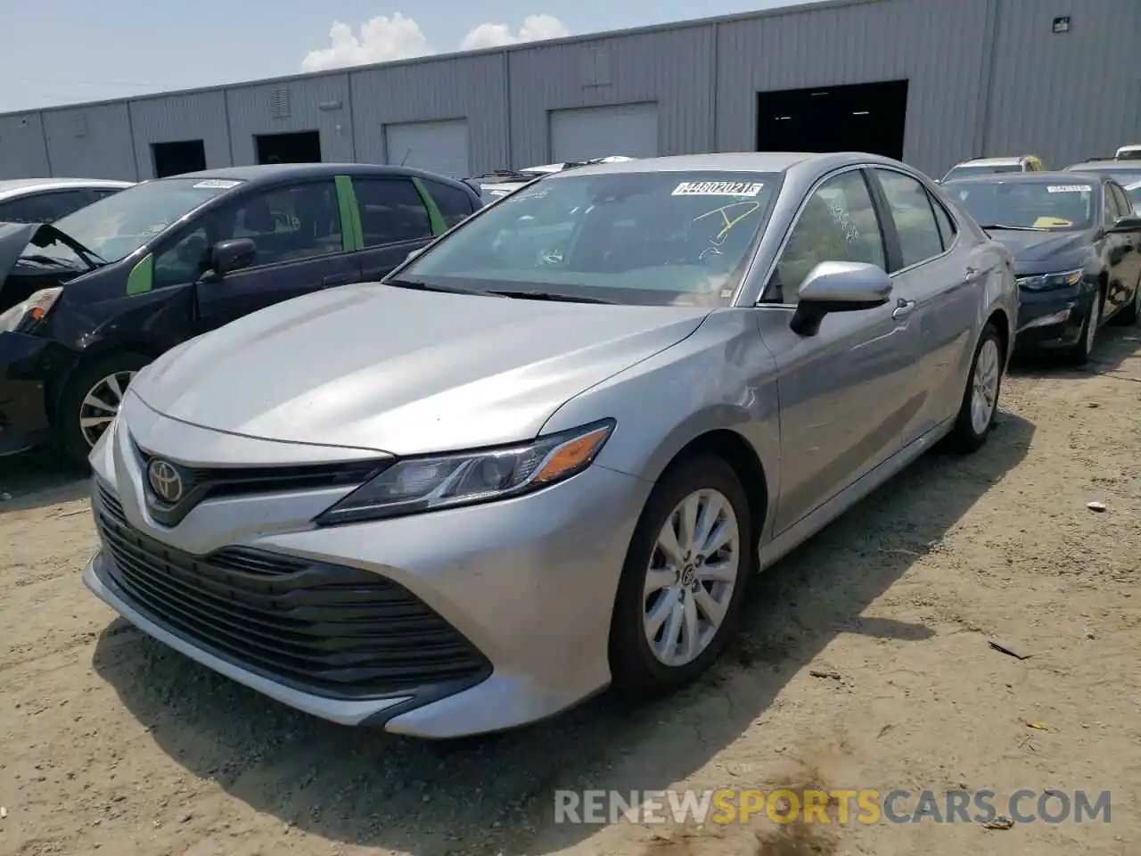 2 Photograph of a damaged car 4T1B11HK7KU238873 TOYOTA CAMRY 2019