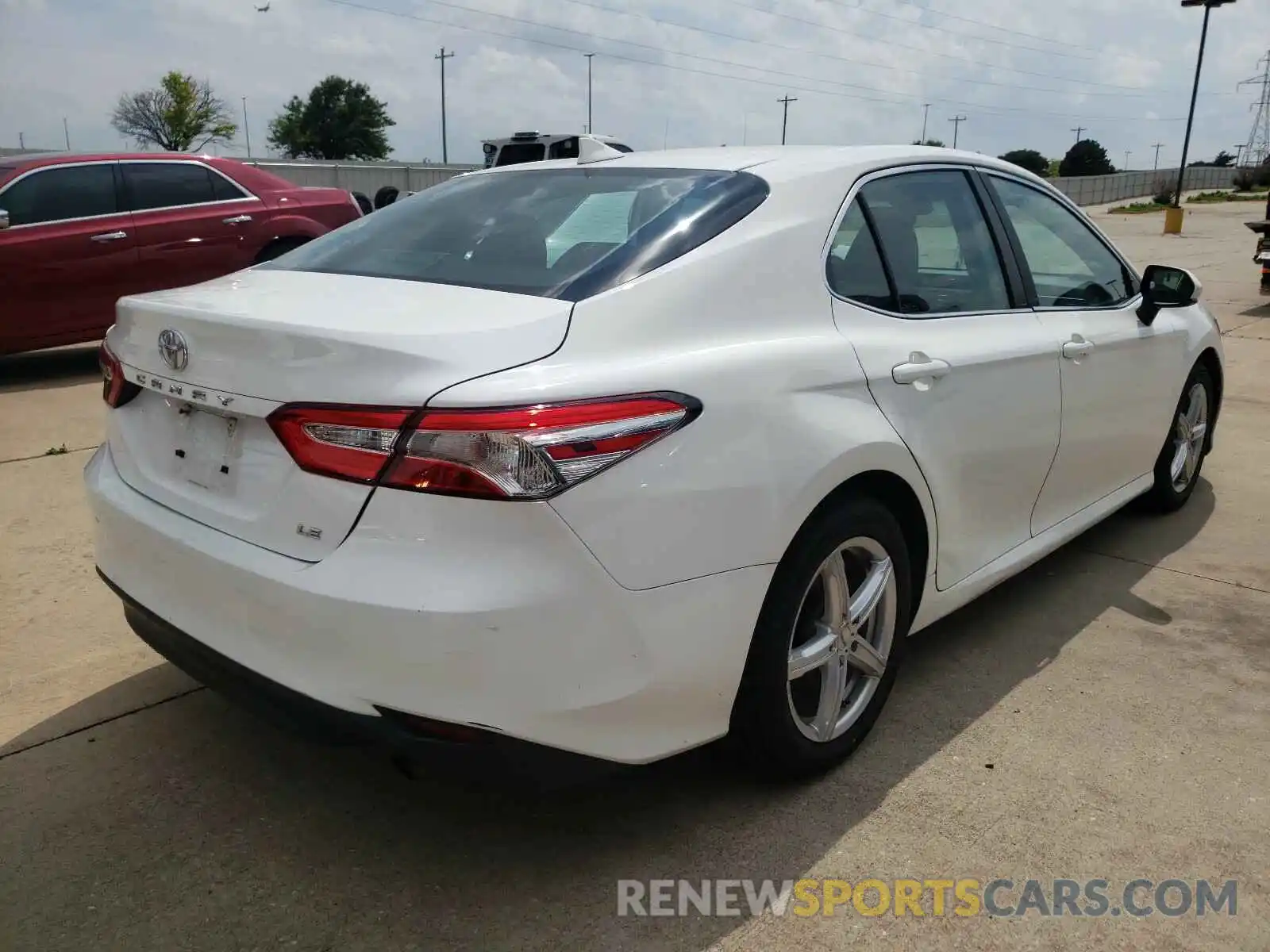 4 Photograph of a damaged car 4T1B11HK7KU239084 TOYOTA CAMRY 2019