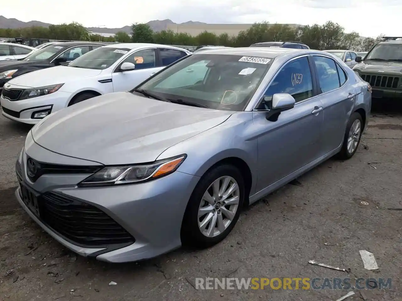 2 Photograph of a damaged car 4T1B11HK7KU239411 TOYOTA CAMRY 2019