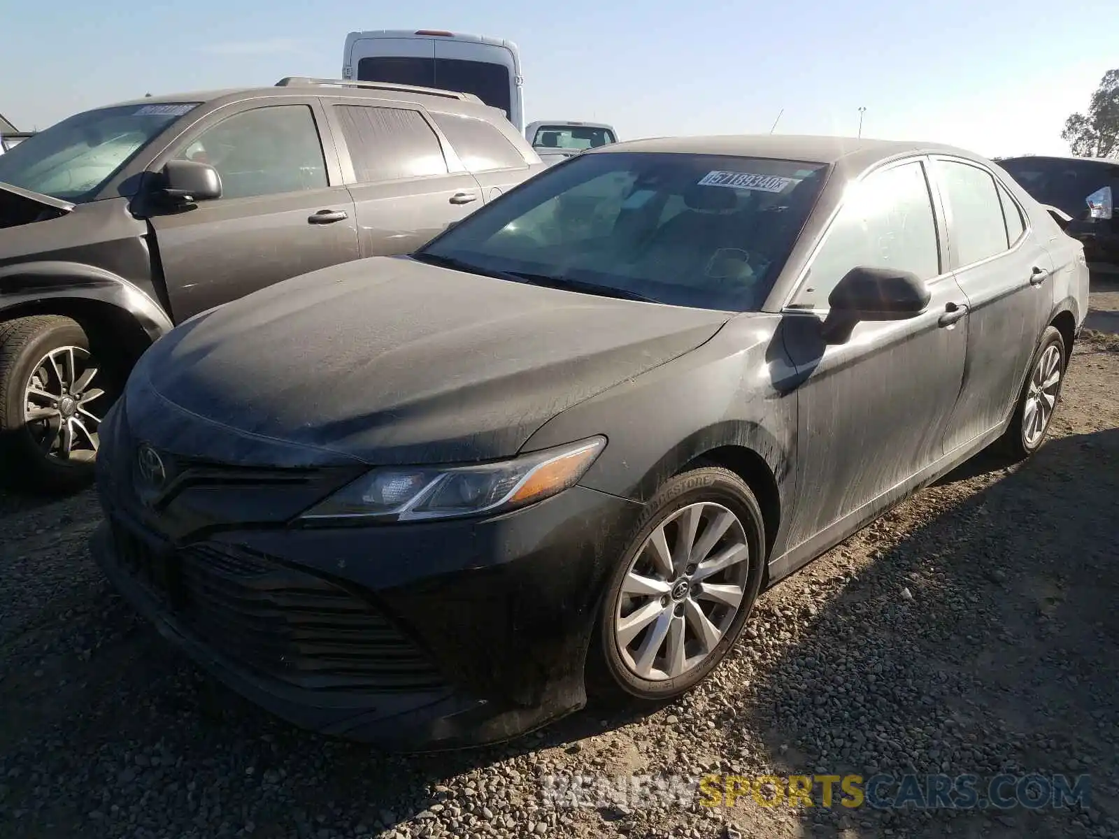 2 Photograph of a damaged car 4T1B11HK7KU239893 TOYOTA CAMRY 2019