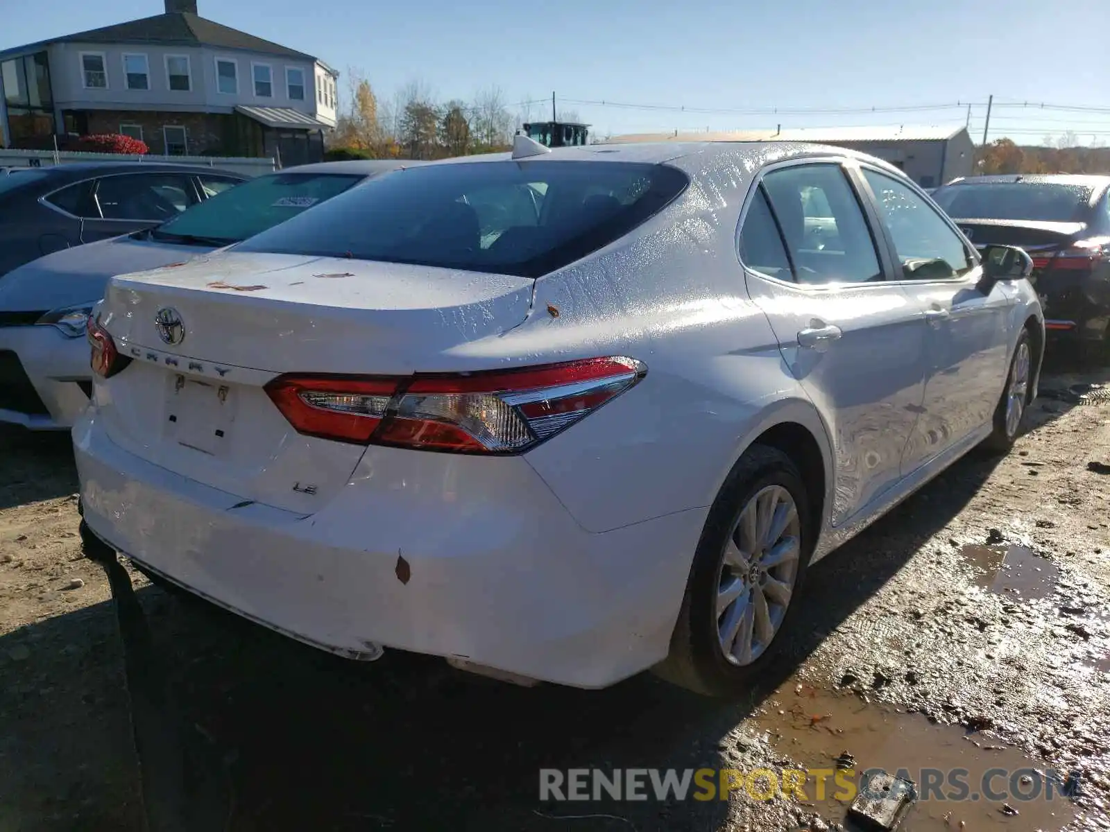 4 Photograph of a damaged car 4T1B11HK7KU240803 TOYOTA CAMRY 2019