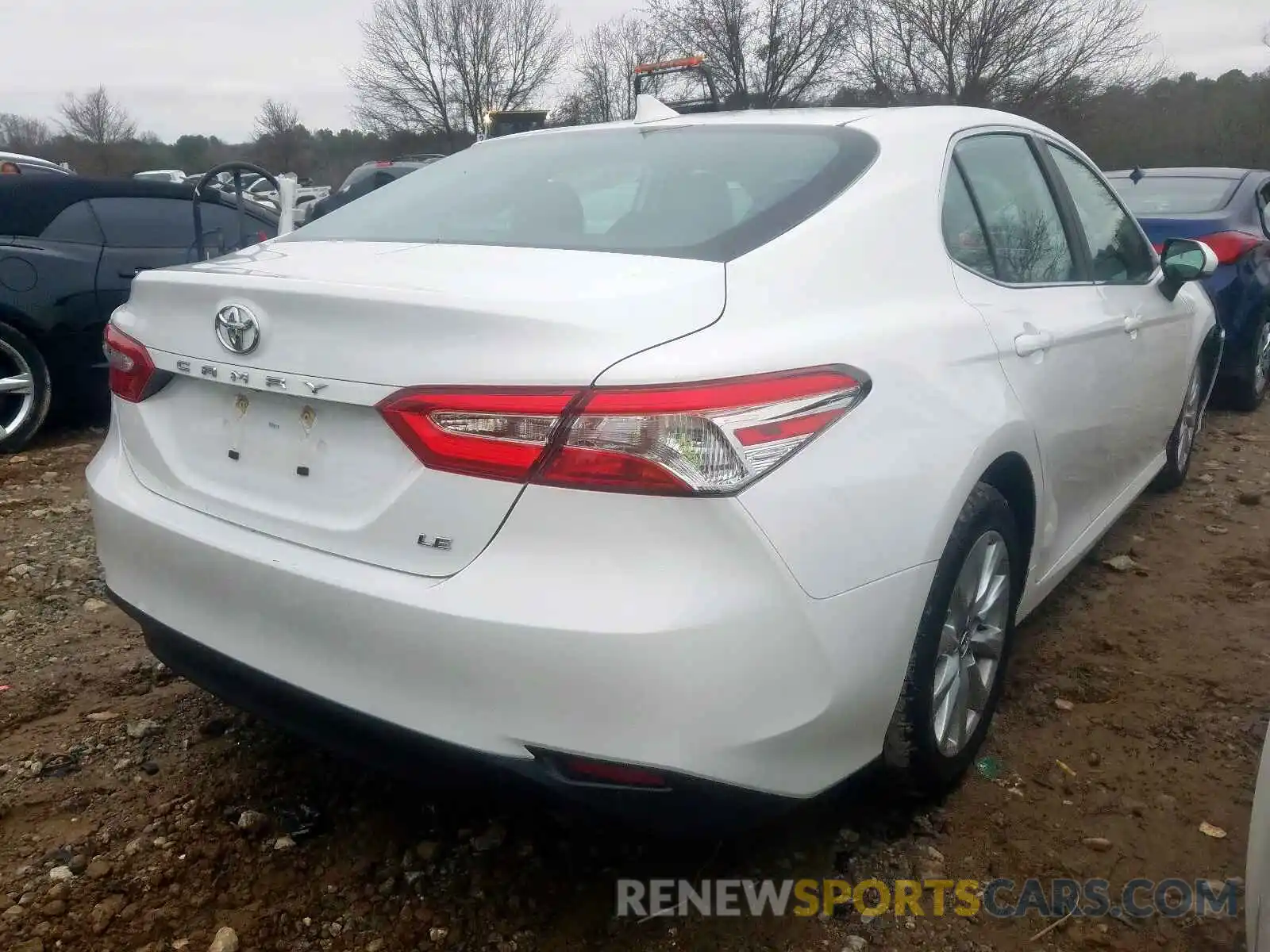 4 Photograph of a damaged car 4T1B11HK7KU240834 TOYOTA CAMRY 2019