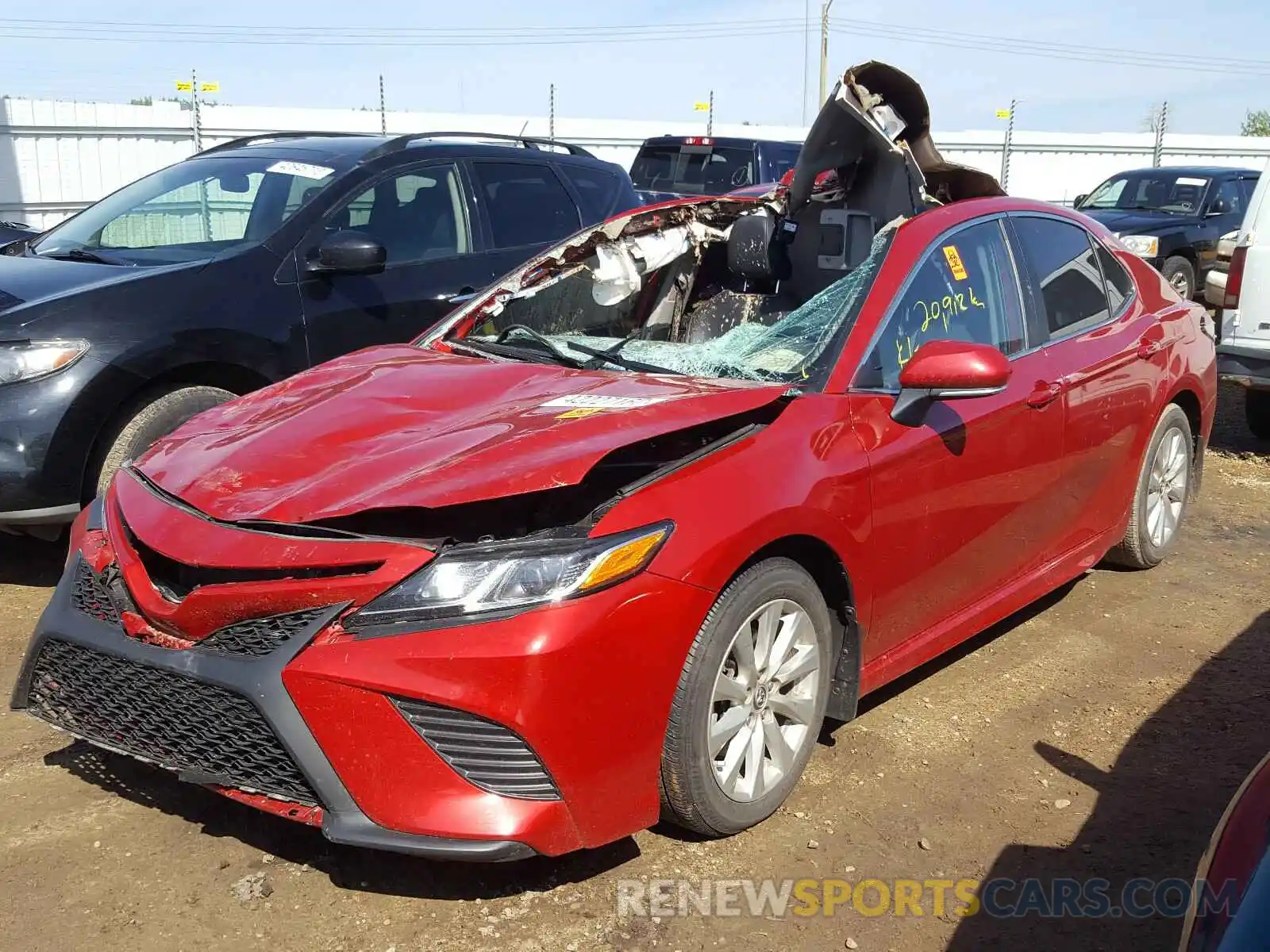 2 Photograph of a damaged car 4T1B11HK7KU240865 TOYOTA CAMRY 2019