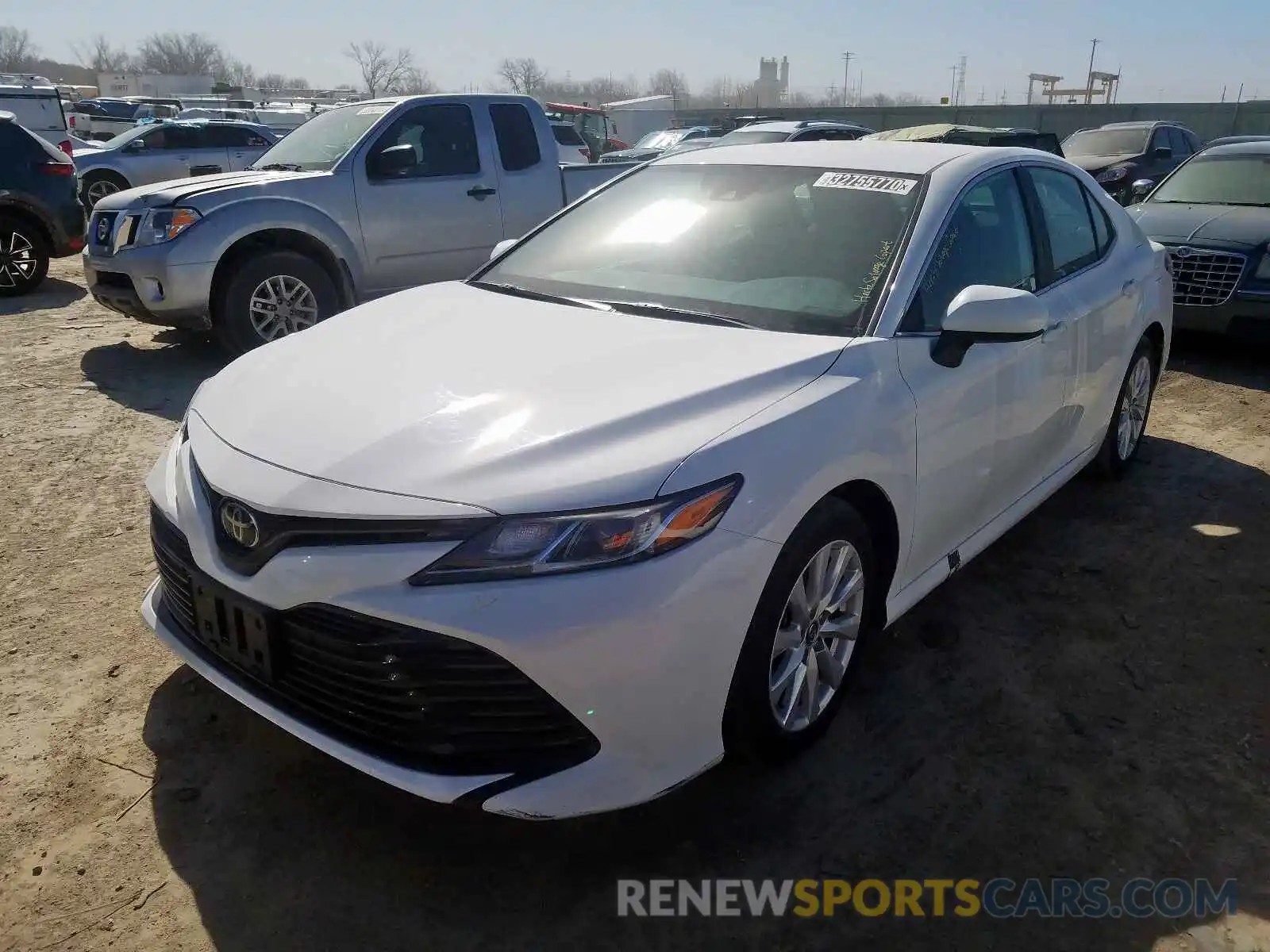 2 Photograph of a damaged car 4T1B11HK7KU241577 TOYOTA CAMRY 2019