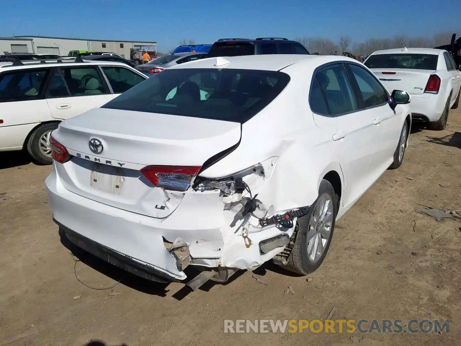 4 Photograph of a damaged car 4T1B11HK7KU241577 TOYOTA CAMRY 2019