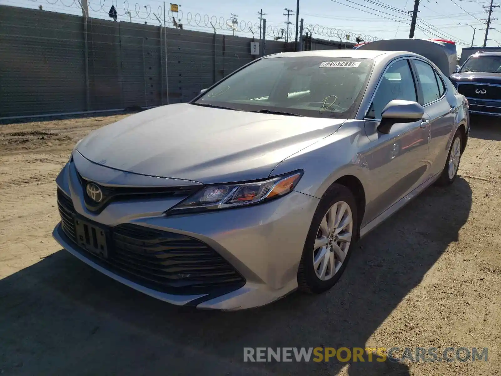 2 Photograph of a damaged car 4T1B11HK7KU242096 TOYOTA CAMRY 2019