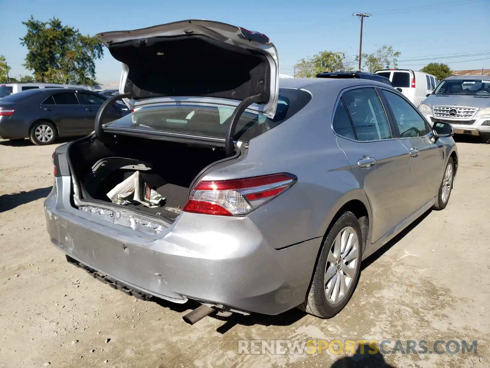 4 Photograph of a damaged car 4T1B11HK7KU242096 TOYOTA CAMRY 2019