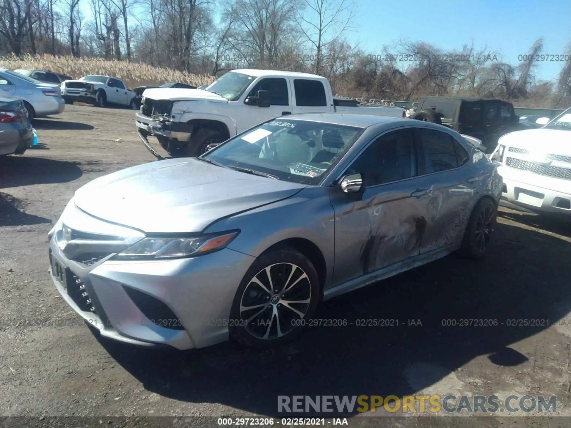 2 Photograph of a damaged car 4T1B11HK7KU242373 TOYOTA CAMRY 2019