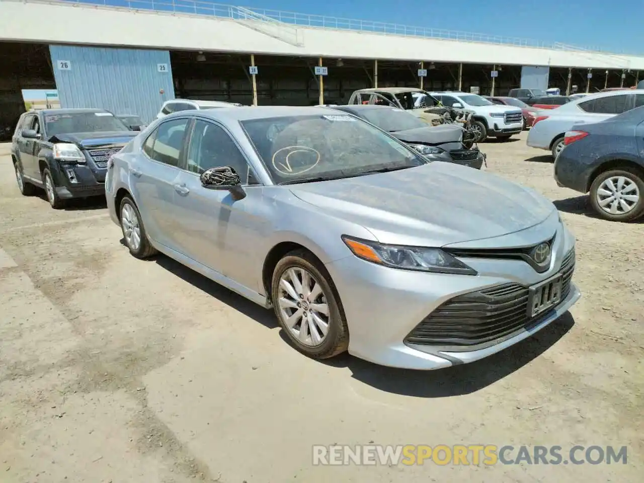 1 Photograph of a damaged car 4T1B11HK7KU242664 TOYOTA CAMRY 2019