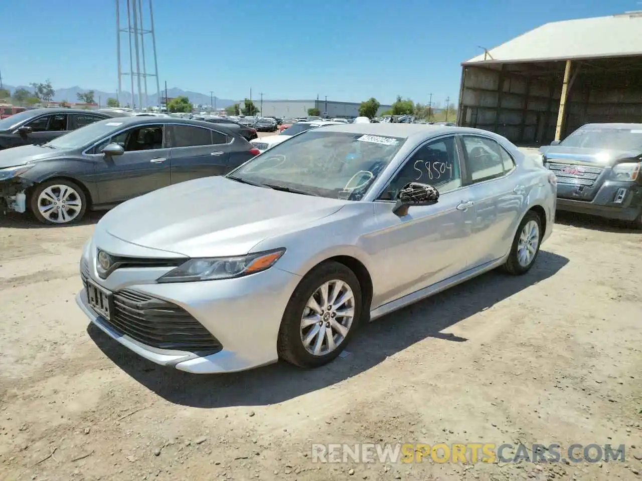 2 Photograph of a damaged car 4T1B11HK7KU242664 TOYOTA CAMRY 2019