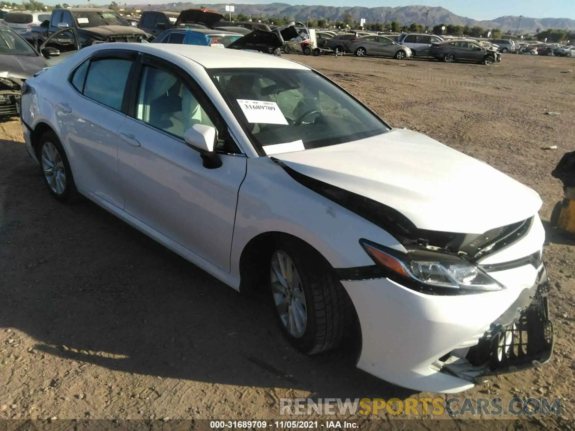 1 Photograph of a damaged car 4T1B11HK7KU242938 TOYOTA CAMRY 2019