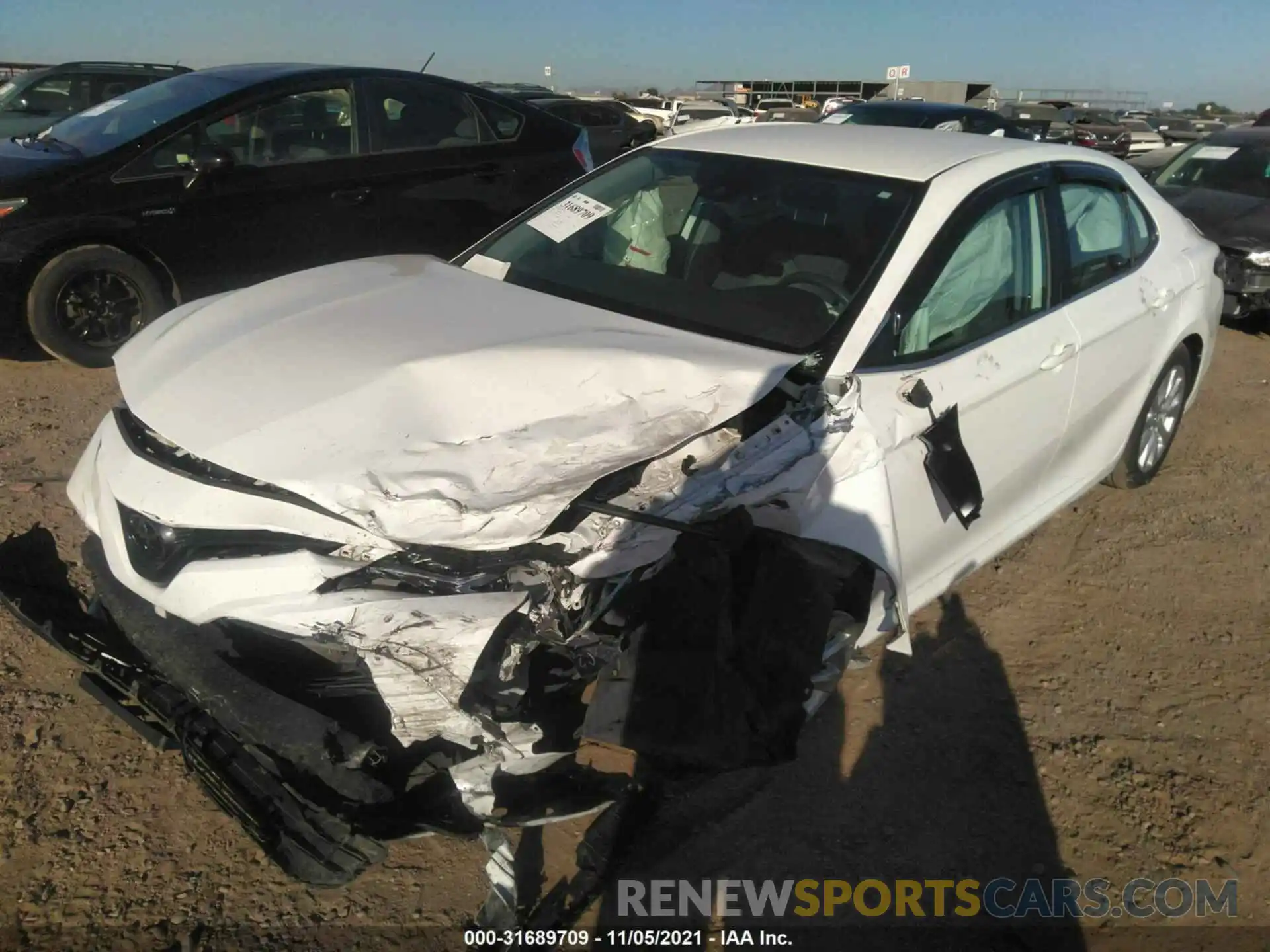 2 Photograph of a damaged car 4T1B11HK7KU242938 TOYOTA CAMRY 2019