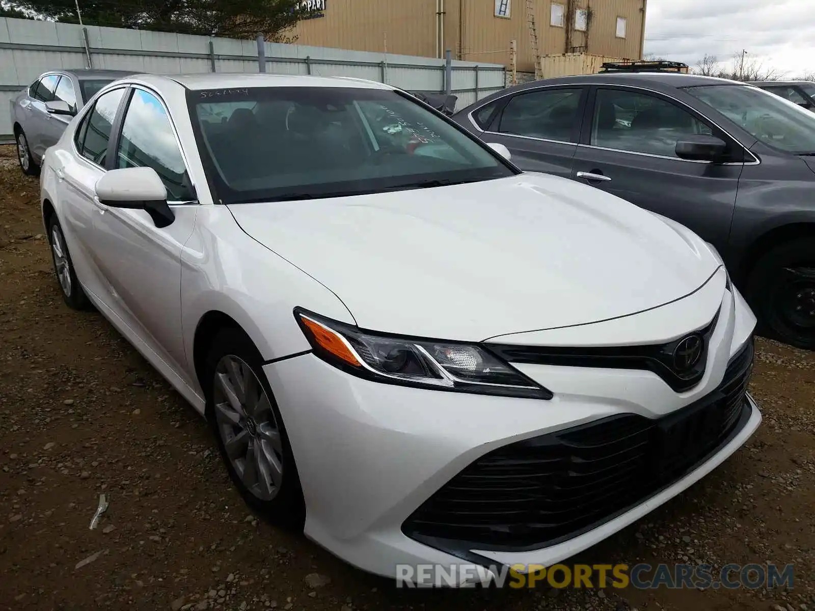 1 Photograph of a damaged car 4T1B11HK7KU243152 TOYOTA CAMRY 2019