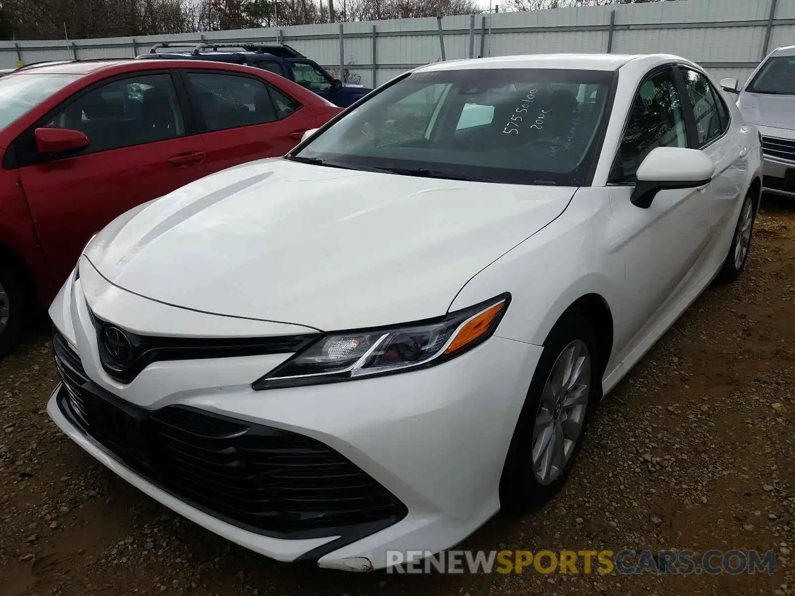 2 Photograph of a damaged car 4T1B11HK7KU243152 TOYOTA CAMRY 2019