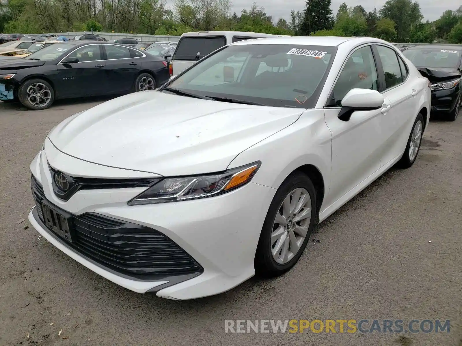 2 Photograph of a damaged car 4T1B11HK7KU243961 TOYOTA CAMRY 2019